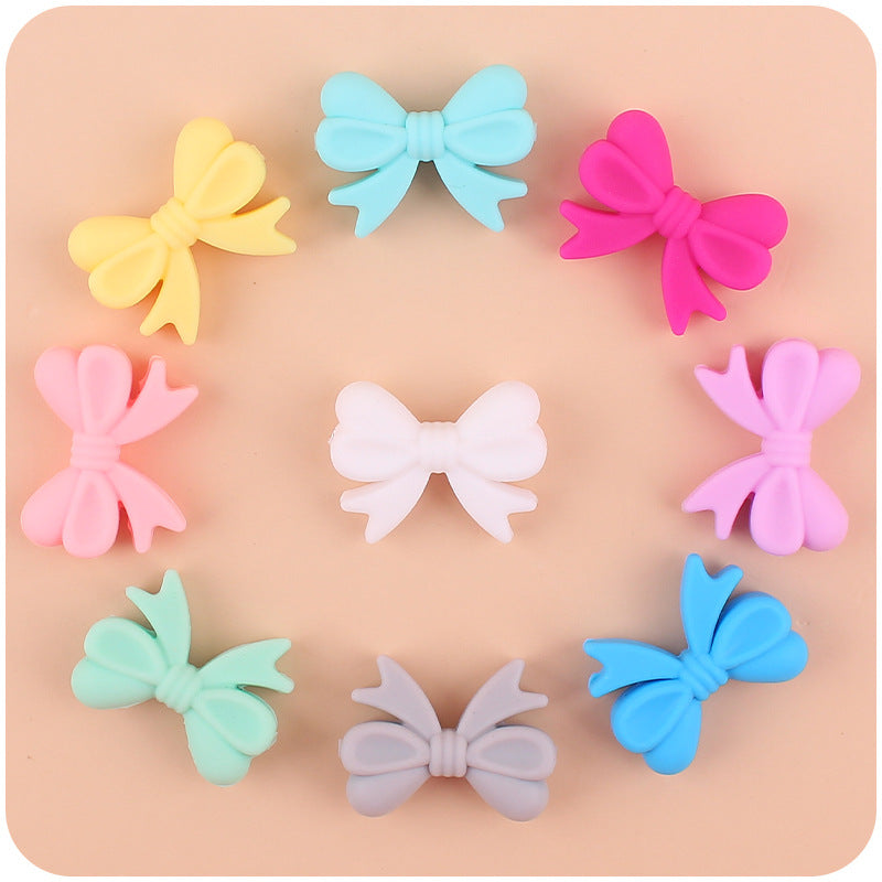 Butterfly knot small tooth glue focal